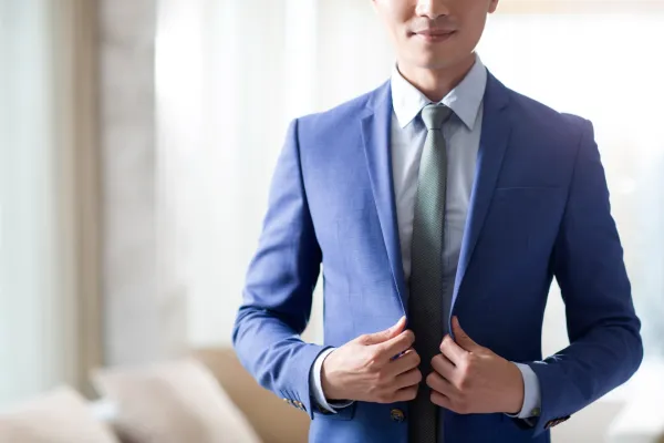 young-businessman-getting-dressed-in-the-morning-2024-10-17-05-21-37-utc-68109c8b6c0e0